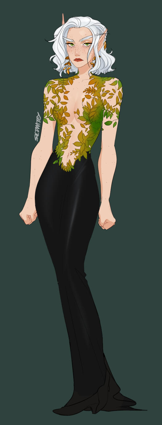 Erilihn in a dress with the top half made of green leaves and the bottom half a simple black skirt.